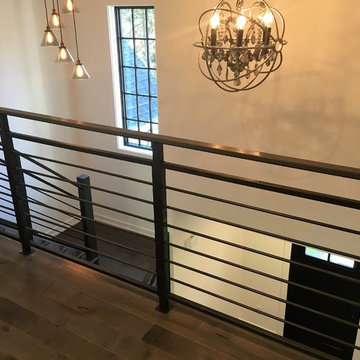 Amanda - horizontal steel railing with wooden newel posts