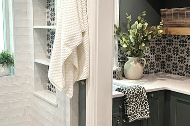Bathroom - mid-sized scandinavian kids' green tile and porcelain tile porcelain tile, beige floor and double-sink bathroom idea in New York with shaker cabinets, white cabinets, a one-piece toilet, green walls, an undermount sink, quartz countertops, white countertops and a freestanding vanity