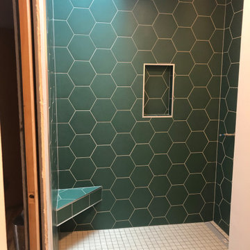 Shower remodel with hexagon tile and niche