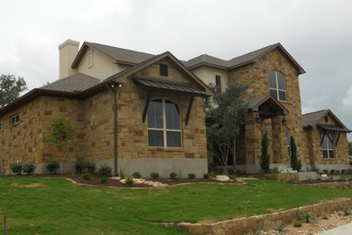 Inspiration for a mediterranean exterior home remodel in Austin