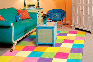 Mid-sized elegant girl carpeted kids' room photo in Orange County with orange walls