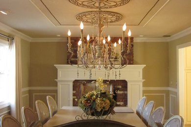 Kitchen/dining room combo - large eclectic light wood floor kitchen/dining room combo idea in New York with beige walls, a standard fireplace and a brick fireplace