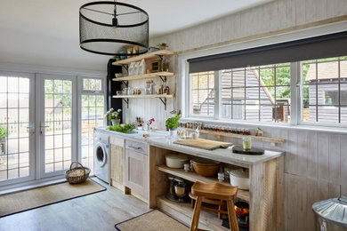 Design ideas for a rustic utility room in Surrey.