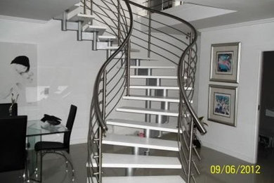 Curved floating steeel and timmber prefabricated modular staircase system