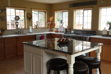 Inspiration for a large cottage l-shaped open concept kitchen remodel in Other with shaker cabinets, light wood cabinets, quartz countertops and an island