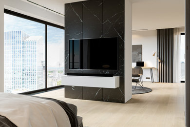 Immagine di un grande soggiorno minimalista stile loft con pareti nere, parquet chiaro, nessun camino, TV a parete, pavimento beige e carta da parati