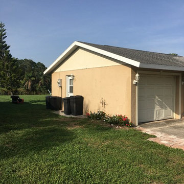exterior paint with stucco renovation on side gable