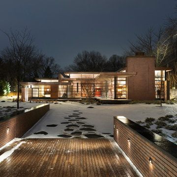 Lac La Belle - Modern Brick Lake Home with Dock and Boathouse