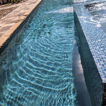 Gorgeous Glass Tile 360 Spillover Spa and lap pool