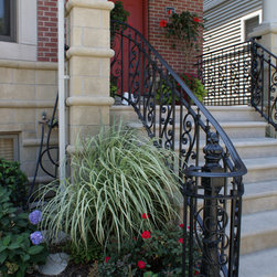 Solid stone stairs with ornamental iron railing - Products