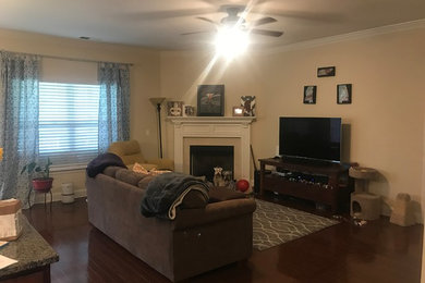Example of a small eclectic open concept dark wood floor and brown floor living room design in Nashville with a corner fireplace and a tile fireplace