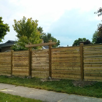 Semi-privacy fence with varying thickness board; custom gate