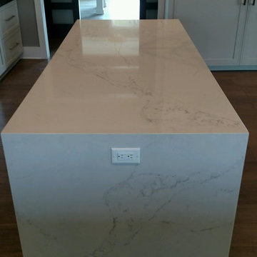 Brown Antique Leathered Granite with Calacatta Fantasy Quartz