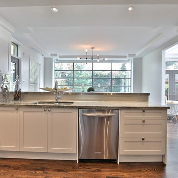 Shaker style kitchen and granite countertop in Toronto