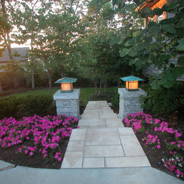 New walkway down the side yard with light posts