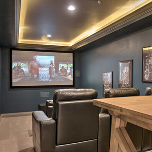 Home theater - cottage carpeted and gray floor home theater idea in Other with gray walls