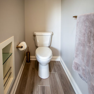 Master Bath with Refaced Vanity and Full Height Porcelain Tile Shower Walls