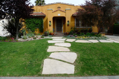 Home design - mid-sized mediterranean home design idea in Los Angeles