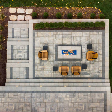 Transforming a Steep Lakefront Slope into an Entertaining Patio | Horton, MI