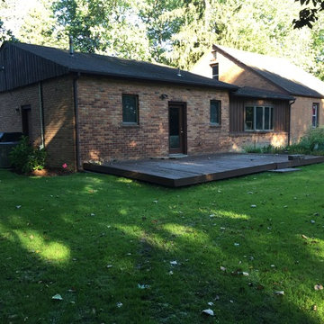 Belgard Mega Libre Custom Two Tier Patio with Custom Built Fire Pit