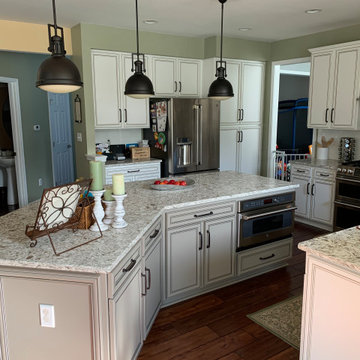 cabinet refacing ant white with brown glaze--quartz and new backsplash