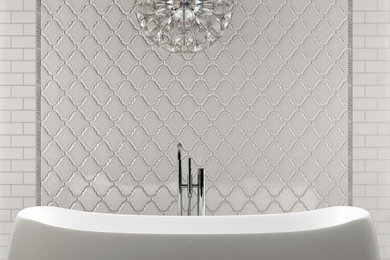 Large minimalist master white tile and porcelain tile marble floor freestanding bathtub photo in Phoenix with white walls