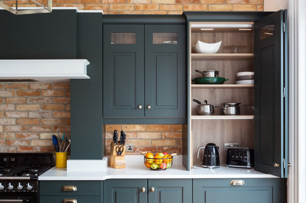 Dark Green Cabinets Add Elegance to a Welcoming Kitchen