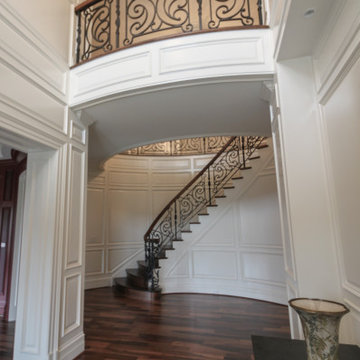 Project #74 | Circular Staircase with Hand-Forged Metal Panels