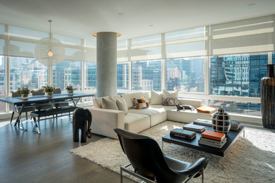 Trendy living room photo in San Francisco with a concealed tv