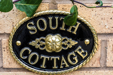 Brass house signs