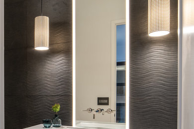 Bathroom - mid-sized modern master black tile and porcelain tile bathroom idea in Seattle with a one-piece toilet, a wall-mount sink and gray countertops