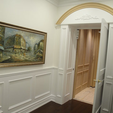York mills home elevator foyer entryway custom wall paneling, crown moulding ,