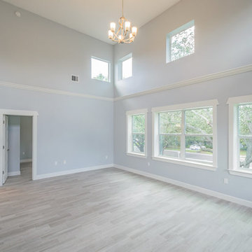 The Sea Breeze | Family Room and Bedroom Two | New Home Builders in Tampa Flori