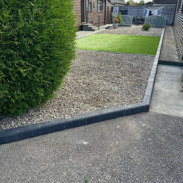 Sett Edge Turning Round a Shingle Bed and Lawn