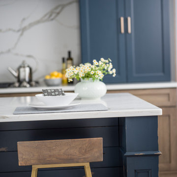 Close Up of Navy Blue Modern Farmhouse Kitchen Island with Decorative Columns an