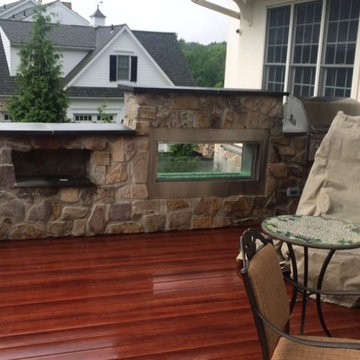 Zuri Deck with Cedar Pergola and Stone Fireplace with Grill