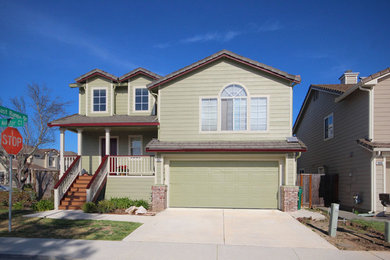 Inspiration for a craftsman green two-story concrete fiberboard exterior home remodel in San Francisco