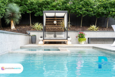 Mid-sized minimalist side yard tile and rectangular pool landscaping photo in Atlanta