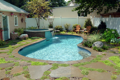 Inspiration for a timeless custom-shaped pool remodel in New York