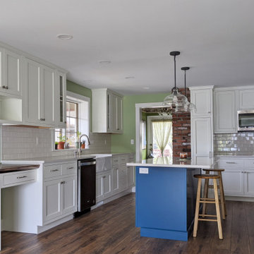 White Cabinets with Contrasting Blue Kitchen Island