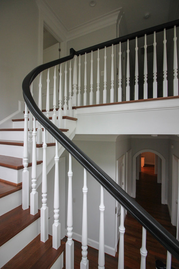 Powerful Impression by Floating Staircase in Suburban Foyer