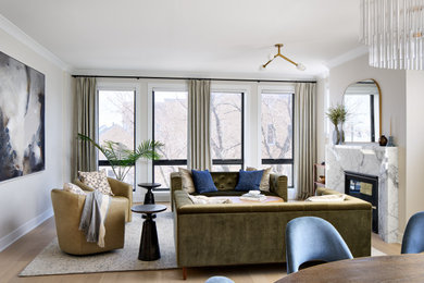Example of a mid-sized transitional open concept light wood floor and brown floor living room design in Chicago with white walls, a standard fireplace and a stone fireplace
