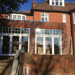 Timber Bi-fold doors with fanlight windows over - Home Improvement