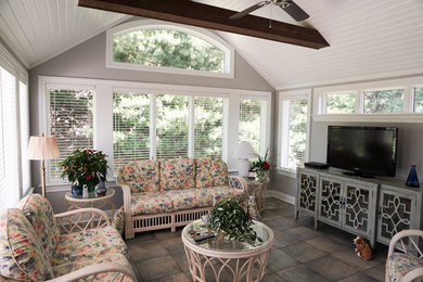 Example of a mid-sized classic ceramic tile sunroom design in Cleveland with a standard ceiling