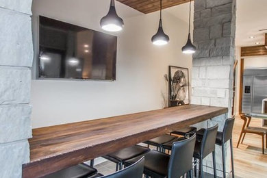 Example of a minimalist home bar design in Other