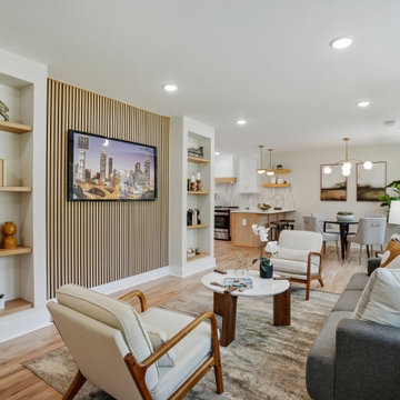 Open-Concept Living Room with Custom Slat Feature Wall