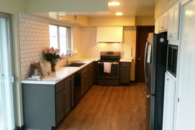 Inspiration for a mid-sized contemporary l-shaped eat-in kitchen remodel in Other with shaker cabinets, laminate countertops, white backsplash and subway tile backsplash