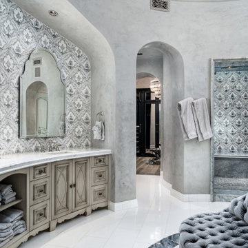Primary Bathroom with Mosaic Tile Shower and Vanity Backsplash