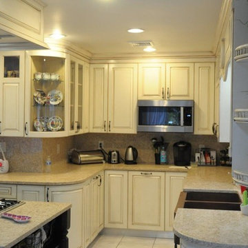Traditional Antique Ivory/Walnut Two Tone Solid-wood kitchen.