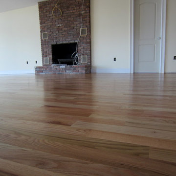 MONTAUK NEW CONSTRUCTION: 3 1/4" #1 RED OAK INSTALLED AND FINISHED NATURAL!